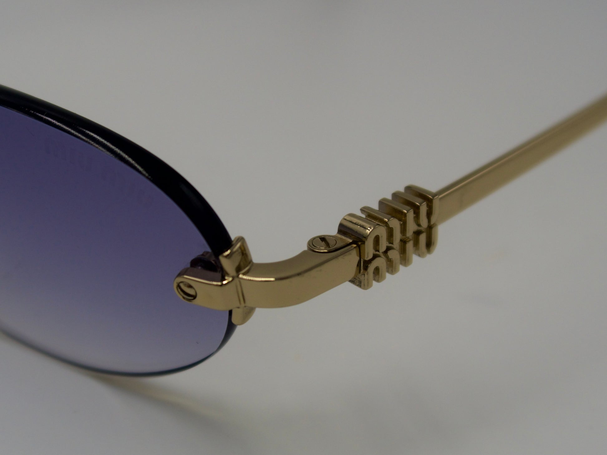 Miu Miu Logo Sunglasses